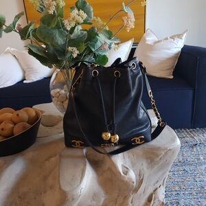 ⛓️- CHANEL CC Logo Lambskin Drawstring Chain Shoulder Bag with Pouch